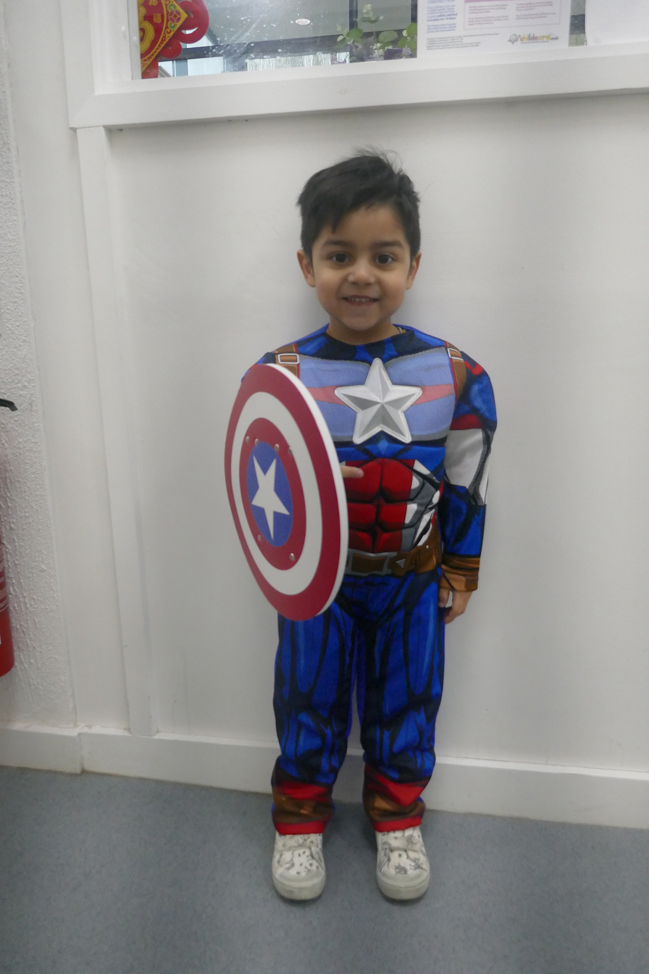 Child dressed as Captain America