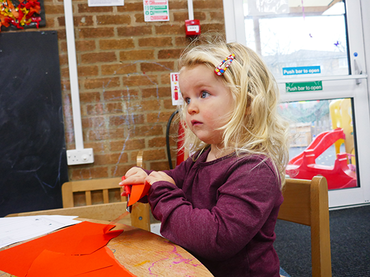 Child doing arts and crafts